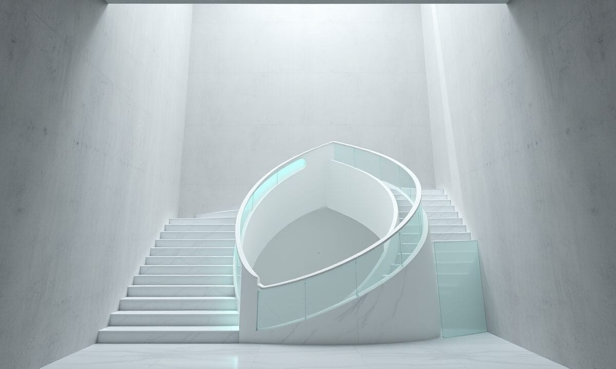 Escalier en marbre blanc spiralé éclairé par des accents vert émeraude dans un studio éditorial épuré